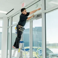 Pete_Cleaning_Commercial_Window_TTM